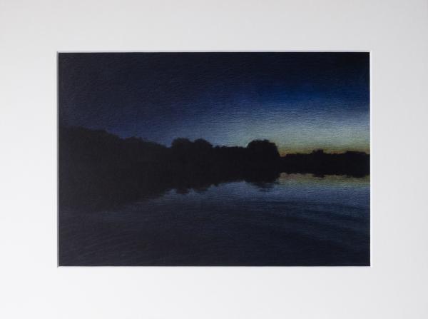 lake at night long after sunset, only some light on the horizon and some refelctions in the water are visible